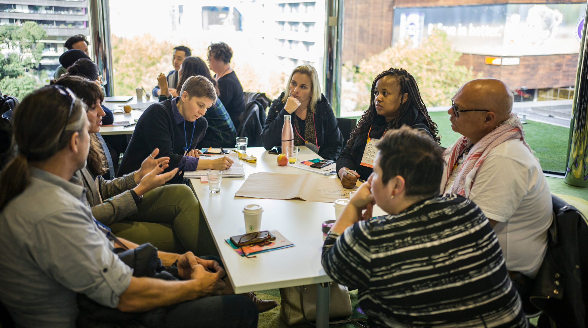 People around a table discussing issue